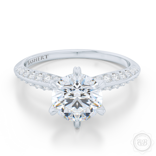 Classic Six-Prong Round Solitaire Engagement Ring. Elegantly beveled knife-edge Diamond shoulders. Handcrafted in White Gold or Platinum. Charles & Colvard Round Brilliant Moissanite. Free Shipping USA.  30Day Returns | BASHERT JEWELRY | Boca Raton Florida