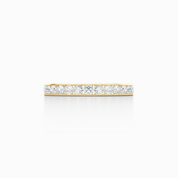 Classic, channel-set Diamond Eternity Wedding Ring. Elegant lines, handcrafted in Classic Yellow Gold and Round Brilliant Diamonds. Free Shipping for All USA Orders. 15 Day Returns | BASHERT JEWELRY | Boca Raton, Florida