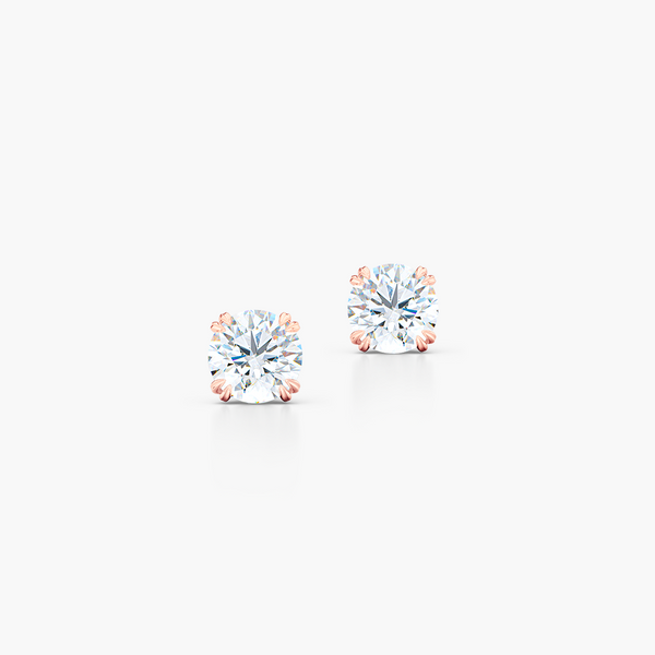 Classic Round Brilliant cut Diamond Stud Earrings. Handcrafted in Romantic Rose Gold. Find The Perfect Pair for Your Budget. Moissanite and Lab-Grown Diamonds options available! Free Shipping on All USA Orders. 30-Day Returns | BASHERT JEWELRY | Boca Raton, Florida.