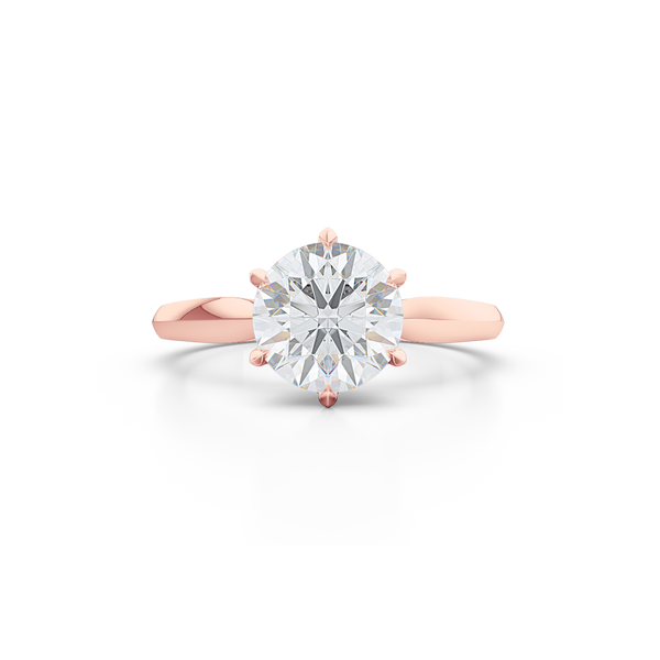 Elegant six-prong Solitaire Engagement Ring. Hand-fabricated in sustainable, solid Romantic Rose Gold and Charles & Colvard Forever One, Round Brilliant Moissanite.  Free Shipping for All USA Orders. 15-Day Returns | BASHERT JEWELRY | Boca Raton, Florida