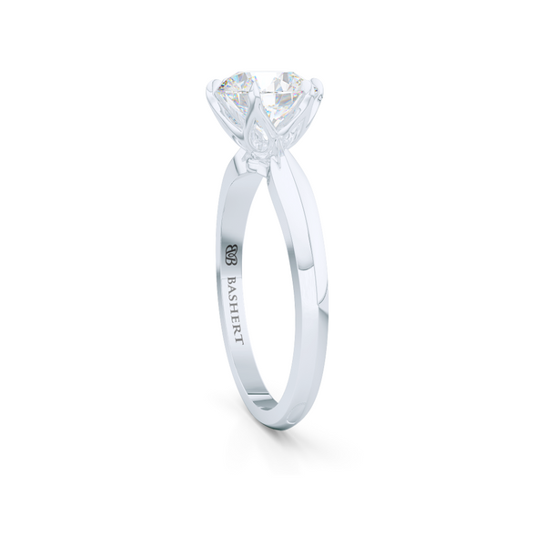 Elegant six-prong Solitaire Engagement Ring. Hand fabricated in solid, sustainable White Gold, or Platinum 950, and handpicked Charles & Colvard Forever One, Round Brilliant Moissanite.  Free Shipping for All USA Orders. 15-Day Returns | BASHERT JEWELRY | Boca Raton, Florida