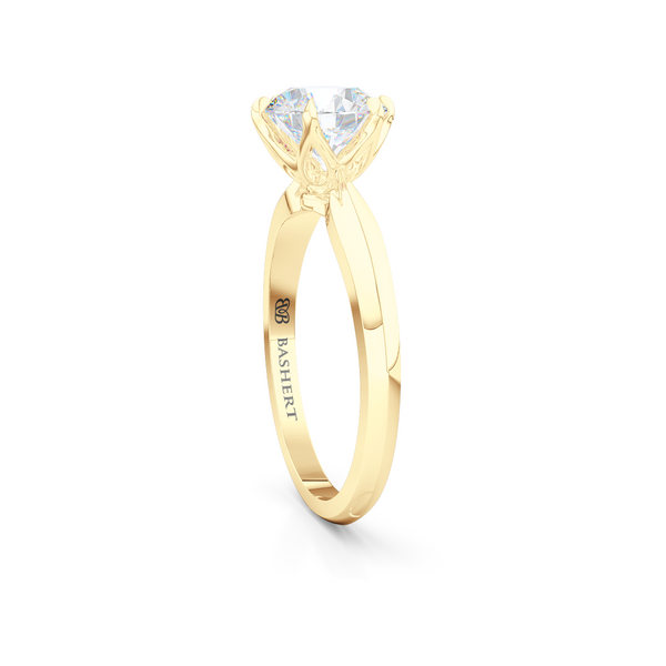 Elegant six-prong Solitaire Engagement Ring. Hand-fabricated in sustainable, solid Classic Yellow Gold and Charles & Colvard Forever One, Round Brilliant Moissanite.  Free Shipping for All USA Orders. 15-Day Returns | BASHERT JEWELRY | Boca Raton, Florida