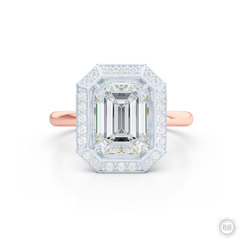Decadent Emerald-cut Diamond Halo Engagement Ring. Crafted in two-tone Rose Gold and Platinum. GIA certified Diamond. Streamlined appeal with a bold, modern look.  Free Shipping USA. 30-Day Returns | BASHERT JEWELRY | Boca Raton, Florida.