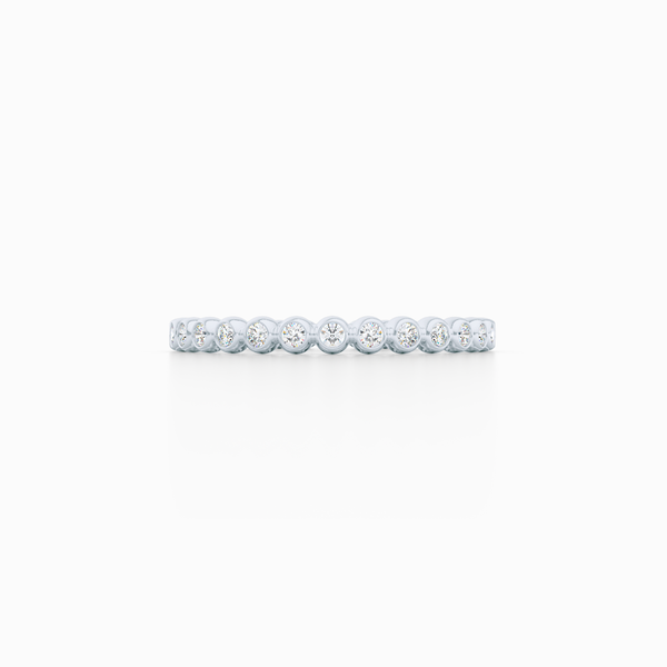 Delicate, bezel-set pots diamond eternity wedding band. Hand-fabricated in solid, sustainable Precious Platinum and premium quality Round, Brilliant Diamonds. Free Shipping for All USA Orders. 15-Day Returns | BASHERT JEWELRY | Boca Raton, Florida