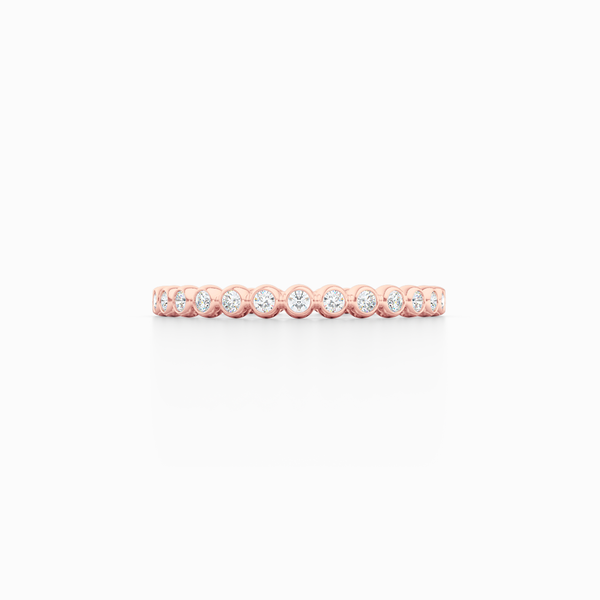 Delicate, bezel-set pots diamond eternity wedding band. Hand-fabricated in solid, sustainable Rose Gold and premium quality Round, Brilliant Diamonds. Free Shipping for All USA Orders. 15-Day Returns | BASHERT JEWELRY | Boca Raton, Florida