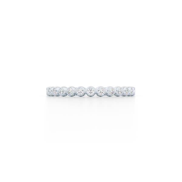 Delicate, bezel-set pots diamond eternity wedding band. Hand-fabricated in solid, sustainable White Gold and premium quality Round, Brilliant Diamonds. Free Shipping for All USA Orders. 15-Day Returns | BASHERT JEWELRY | Boca Raton, Florida