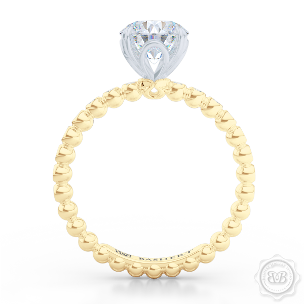 Classic Four-Prong Round Solitaire Engagement Ring Crafted in two-tone Yellow Gold and Platinum. Dazzling Bezel-Set Ring Shoulders. Charles & Colvard Forever One Brilliant Moissanite.  Free Shipping USA 30-Day Returns | BASHERT JEWELRY | Boca Raton, Florida