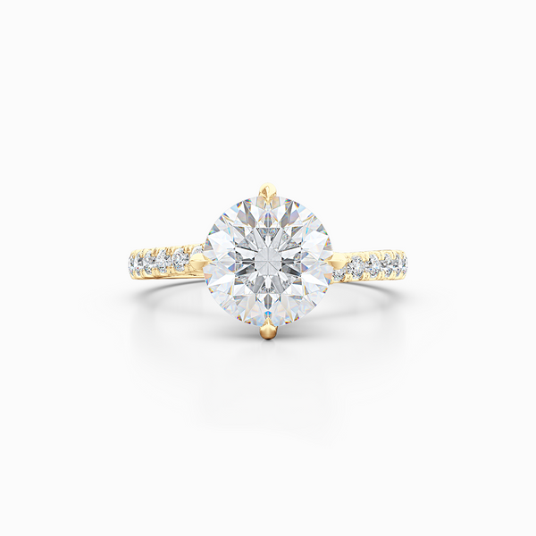 East-West, four prong, Round Solitaire. Recessed diamond halo. Diamond adorned shoulders. Hand-fabricated in Sustainable Solid Yellow Gold. Available in Moissanite by Charles & Colvard or Lab-Grown Diamond by Diamond Foundry. | Made in Boca Raton, Florida. 15 Day Returns. Free Shipping USA. | Bashert Jewelry 