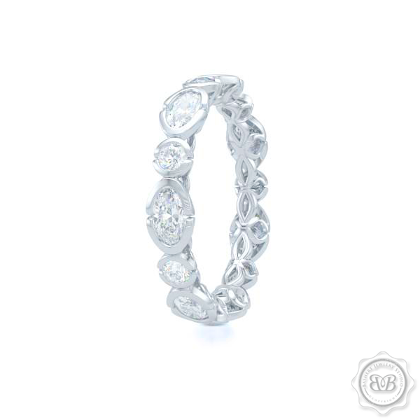 Unique Eternity Ring. Handcrafted in White Gold or Precious Platinum. Adorned with array of Round and Oval Charles & Colvart Moissanites. Geometrical Wedding, Eternity, Stackable Band that can be customized with gemstones of your choice. Free Shipping on All USA Orders. 30-Day Returns | BASHERT JEWELRY | Boca Raton, Florida