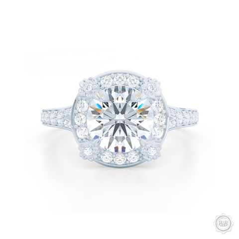 Flower inspired Round Diamond Halo Engagement ring with a vintage appeal, set in White Gold or Platinum. Signature floret prongs, dazzling baby-split ring shoulders. Gia certified Round Brilliant Diamond. Free Shipping USA. 30-Day Returns | BASHERT JEWELRY | Boca Raton, Florida.