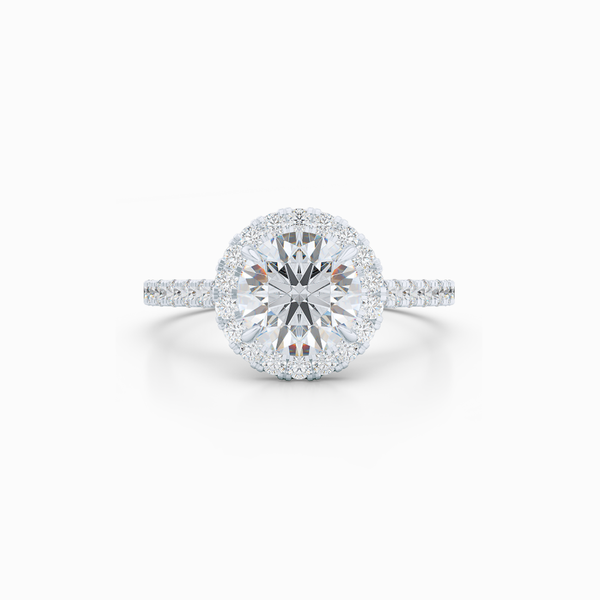 Classic Round Halo Engagement Ring, hand-fabricated in White Gold and Round Brilliant, Forever-One Moissanite by Charles and Colvard. Dazzling diamond micro pavè set shoulders. Free Shipping USA. 15 Day Returns | BASHERT JEWELRY | Boca Raton, Florida.