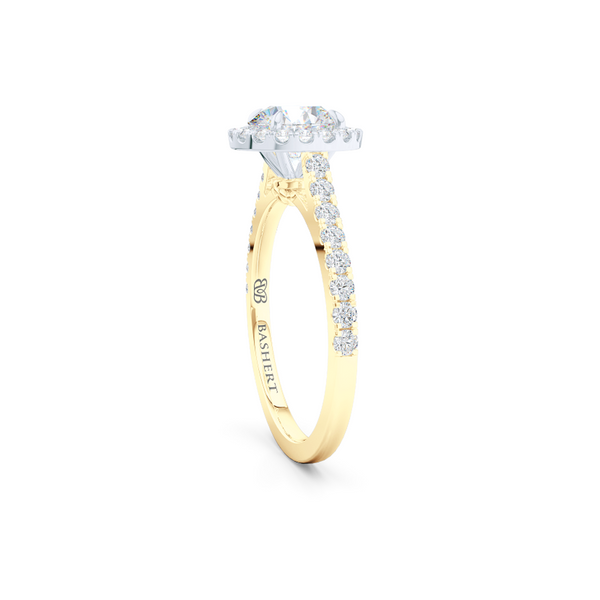 Classic micro-pavé round Halo Engagement Ring. Hand-fabricated in solid, sustainable Yellow Gold and Precious Platinum crown. GIA certified Round Brilliant Diamond. Free Shipping USA. 15 Day Returns | BASHERT JEWELRY | Boca Raton, Florida