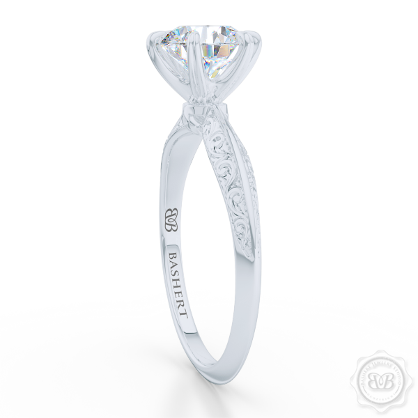 Classic knife-edge, Six-Prong Round Solitaire Engagement Ring. Crafted in White Gold or Precious Platinum. Elegantly hand-engraved shoulders. FOREVER ONE Round Brilliant Moissanite. Free Shipping USA. 30-Day Returns | BASHERT JEWELRY | Boca Raton, Florida