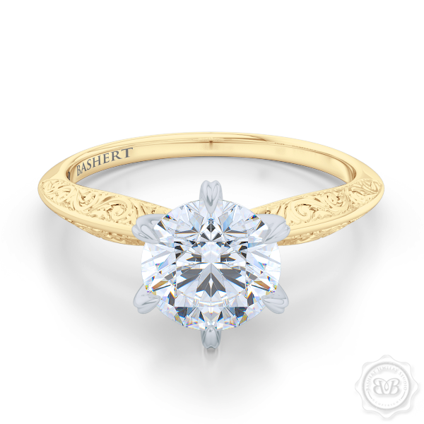Classic knife-edge, Six-Prong Round Solitaire Engagement Ring. Crafted in Classic Yellow Gold. Elegantly hand-engraved shoulders. FOREVER ONE Round Brilliant Moissanite. Free Shipping USA. 30-Day Returns | BASHERT JEWELRY | Boca Raton, Florida