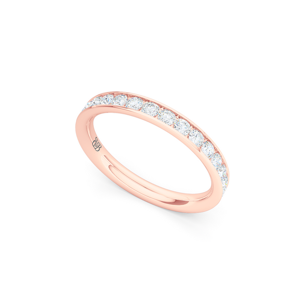 Classic, channel-set Diamond Eternity Wedding Ring. Elegant lines, handcrafted in Romantic Rose Gold and Round Brilliant Diamonds. Free Shipping for All USA Orders. 15 Day Returns | BASHERT JEWELRY | Boca Raton, Florida