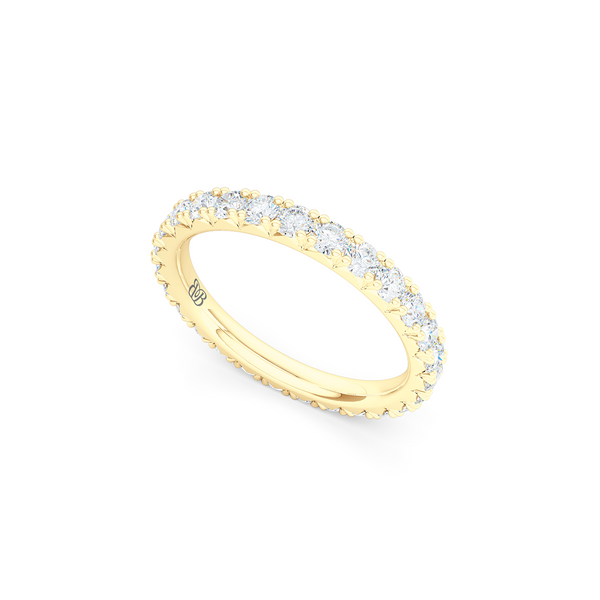 Classic French fishtail-set Diamond Eternity Wedding Ring. Hand-fabricated in Classic Yellow Gold and round brilliant diamonds. Free Shipping for All USA Orders.  BASHERT JEWELRY | Boca Raton, Florida