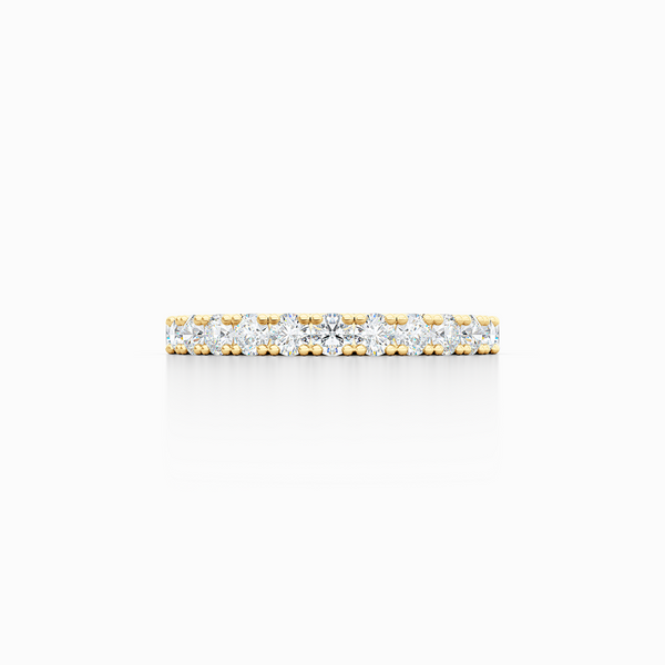 Classic French fishtail-set Diamond Eternity Wedding Ring. Hand-fabricated in Classic Yellow Gold and round brilliant diamonds. Free Shipping for All USA Orders.  BASHERT JEWELRY | Boca Raton, Florida