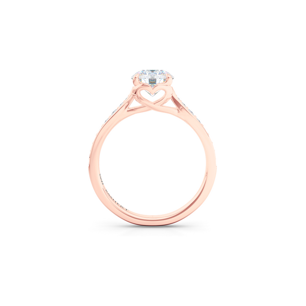 Award-Winning, Round Solitaire Engagement Ring. Hand-fabricated in solid, sustainable Rose Gold. Signature Heart Crown showcasing a Charles & Colvard, Forever One Round Brilliant Moissanite. Diamond Shoulders. Free Shipping USA. 15 Day Returns | BASHERT JEWELRY | Boca Raton, Florida