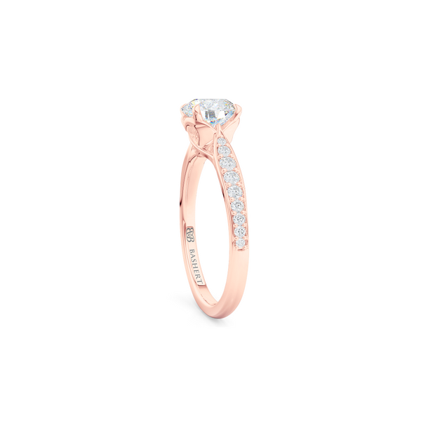 Award-Winning, Round Solitaire Engagement Ring. Hand-fabricated in solid, sustainable Rose Gold. Signature Heart Crown showcasing a Charles & Colvard, Forever One Round Brilliant Moissanite. Diamond Shoulders. Free Shipping USA. 15 Day Returns | BASHERT JEWELRY | Boca Raton, Florida