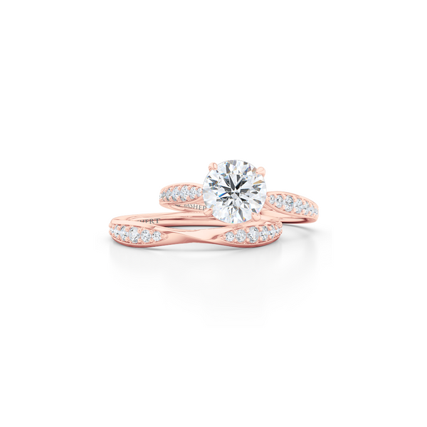 Award-Winning, Round Solitaire Engagement Ring. Hand-fabricated in solid, sustainable Rose Gold. Signature Heart Crown showcasing a Charles & Colvard, Forever One Round Brilliant Moissanite. Diamond Shoulders. Free Shipping USA. 15 Day Returns | BASHERT JEWELRY | Boca Raton, Florida