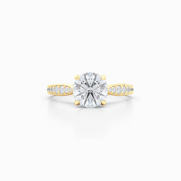 Award-Winning Round Solitaire Engagement Ring. Hand-fabricated in solid, sustainable Yellow Gold. Signature Heart Crown showcasing a handpicked, GIA certified Round Brilliant Diamond. Diamond Shoulders. Free Shipping USA. 15 Day Returns | BASHERT JEWELRY | Boca Raton, Florida