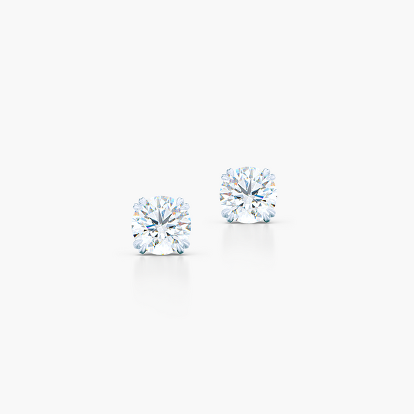 Classic Round Brilliant cut Moissanite Stud Earrings. Handcrafted in White Gold. Find The Perfect Pair for Your Budget.  Lab-Grown Diamonds options available! Free Shipping on All USA Orders. 30-Day Returns | BASHERT JEWELRY | Boca Raton, Florida.
