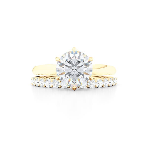 Elegant six-prong Solitaire Engagement Ring. Hand-fabricated in sustainable, solid Classic Yellow Gold and Charles & Colvard Forever One, Round Brilliant Moissanite.  Free Shipping for All USA Orders. 15-Day Returns | BASHERT JEWELRY | Boca Raton, Florida