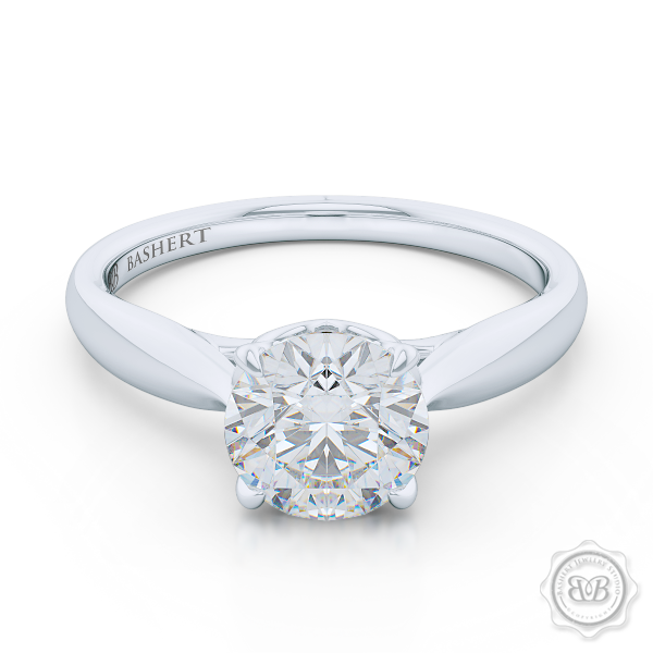 Award-Winning Solitaire Engagement Ring Design. Classic Round Solitaire Handcrafted in White Gold or Precious Platinum. Signature "Infinity Heart" Crown Accentuated by Gently Tapered Shoulders. Forever One Round Brilliant Moissanite.  Free Shipping USA. 30-Day Returns | BASHERT JEWELRY | Boca Raton, Florida