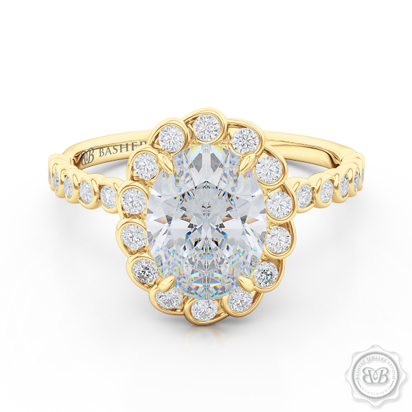 Luscious Oval Cut FOREVER ONE Moissanite Halo Engagement Ring, Crafted in Classic Yellow Gold. Stunning Halo Crown of Bezel-Set Diamonds Encrusted in Elegant Ocean Swirls. Free Shipping USA. 30-Day Returns | BASHERT JEWELRY | Boca Raton, Florida