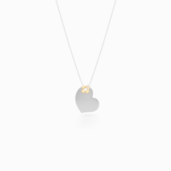 Delicate, two-tone Heart Pendant Necklace. Hand-fabricated in Sterling Silver and solid Yellow Gold, lucky-clover-flower accent. Free Shipping to all USA. 15 Day Returns.  BASHERT JEWELRY | Boca Raton, Florida