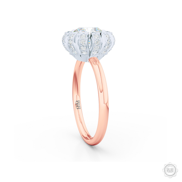 Decadent Round Brilliant Diamond Halo. Crafted in two-tone Rose Gold and Platinum. GIA certified Diamond. Streamlined appeal with bold modern look. Free Shipping USA. 30-Day Returns | BASHERT JEWELRY | Boca Raton, Florida.