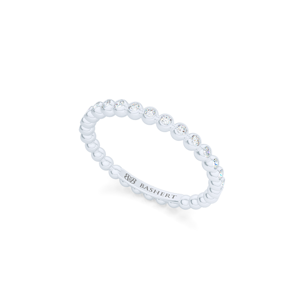 Delicate, bezel-set pots diamond eternity wedding band. Hand-fabricated in solid, sustainable Precious Platinum and premium quality Round, Brilliant Diamonds. Free Shipping for All USA Orders. 15-Day Returns | BASHERT JEWELRY | Boca Raton, Florida