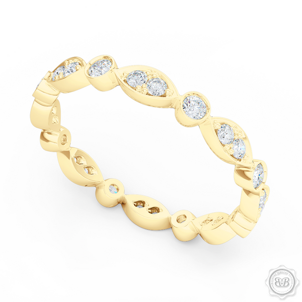 A delicate, eternity diamond wedding ring, handcrafted in Classic Yellow Gold. A brilliant array of premium quality round brilliant diamonds, set in round and marquise bezel pods. Free Shipping for All USA Orders. 30-Day Returns | BASHERT JEWELRY | Boca Raton, Florida