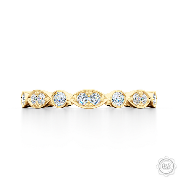 A delicate, eternity diamond wedding ring, handcrafted in Classic Yellow Gold. A brilliant array of premium quality round brilliant diamonds, set in round and marquise bezel pods. Free Shipping for All USA Orders. 30-Day Returns | BASHERT JEWELRY | Boca Raton, Florida
