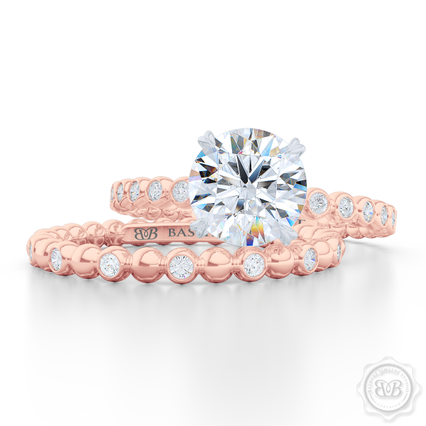 Classic Four-Prong Round Solitaire Engagement Ring Crafted in two-tone Rose Gold and Platinum. Dazzling Bezel-Set Ring Shoulders. Charles & Colvard Forever One Brilliant Moissanite.  Free Shipping USA 30-Day Returns | BASHERT JEWELRY | Boca Raton, Florida