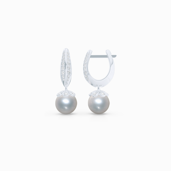 Elegant Pearl dangle earrings. Diamond iced, knife-edge hoops, hand-fabricated in sustainable, solid White Gold, or Platinum. Genuine White Akoya Pearl or South Sea White Pearl dangle bottoms. One Hoop – Many Possibilities. Free Shipping on All USA Orders. 15-Day Returns | BASHERT JEWELRY | Boca Raton, Florida
