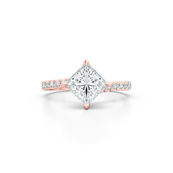 A unique, east-west princess cut Solitaire. Recessed diamond halo. Diamond-adorned shoulders. Hand-fabricated in Romantic Rose Gold. Available in GIA certified Diamond or Lab-Grown Diamond by Diamond Foundry. | Made in Boca Raton, Florida. 15 Day Returns. Free Shipping USA. | Bashert Jewelry 