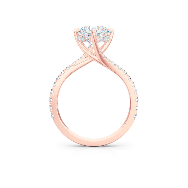 East-West, four prong, Round Solitaire. Recessed diamond halo. Diamond adorned shoulders. Hand-fabricated in Sustainable Solid Rose Gold. Available in Moissanite by Charles & Colvard or Lab-Grown Diamond by Diamond Foundry. | Made in Boca Raton, Florida. 15 Day Returns. Free Shipping USA. | Bashert Jewelry 