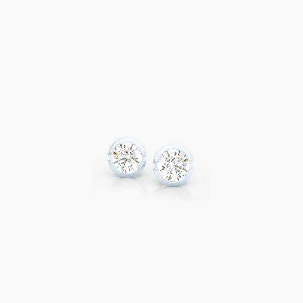 Elegant Round Stud Earrings. Crafted in White Gold. Round Brilliant Forever One Moissanite. Lab-grown Diamonds. Free Shipping on All USA Orders. 30-Day Returns | BASHERT JEWELRY | Boca Raton, Florida.