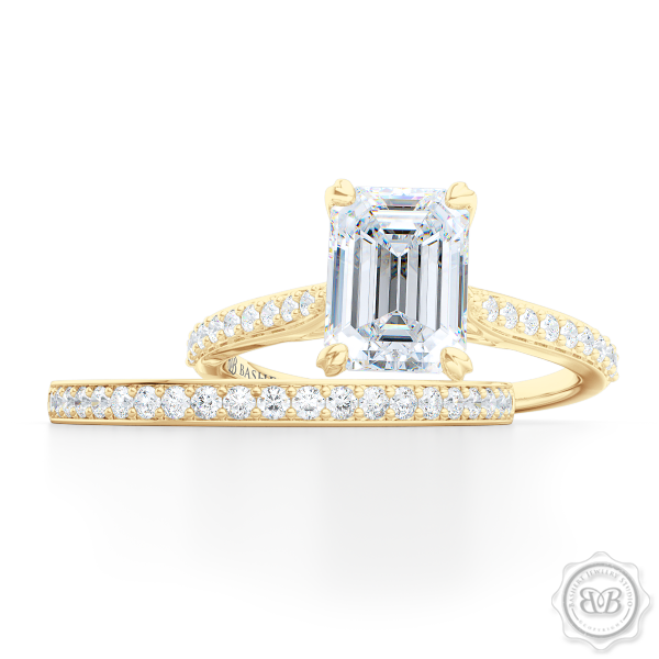 Classic Emerald Cut Solitaire Ring. Handcrafted in two-tone Yellow Gold and Platinum. Charles & Colvard Forever One Emerald-cut Moissanite. Elegant, Bead-Set Diamond Shoulders. Free Shipping USA. 30-Day Returns | BASHERT JEWELRY | Boca Raton, Florida