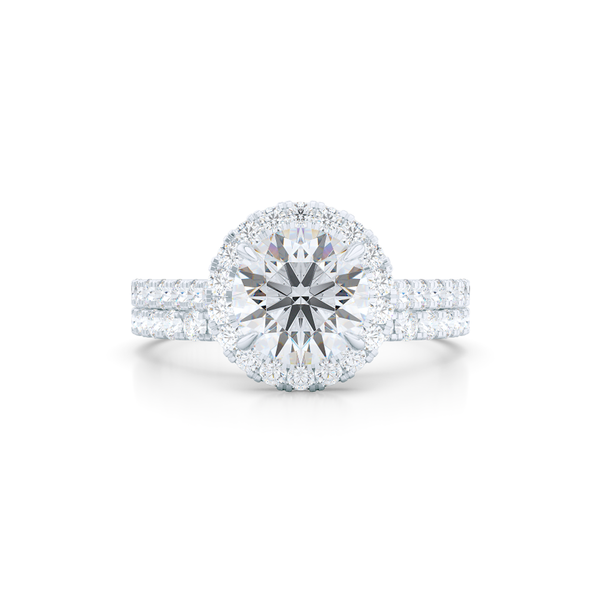 Classic micro-pavé round Halo Engagement Ring. Hand-fabricated in solid, sustainable Precious Platinum. Forever One certified Round Brilliant Moissanite by Charles and Colvard. Free Shipping USA. 15 Day Returns | BASHERT JEWELRY | Boca Raton, Florida
