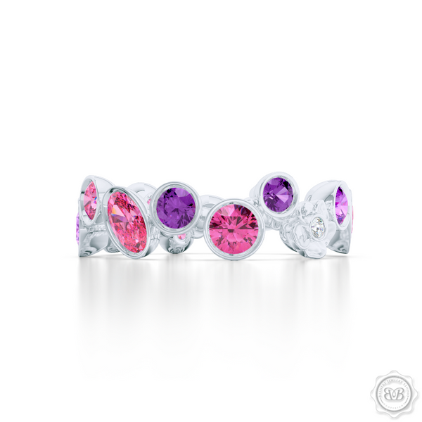 Unique Floral Motif Eternity Ring, Handcrafted in White Gold, Lilac Amethysts, and Pink Tourmalines. Customize it with Birthstones or Anniversary gems of Your Choice. Free Shipping USA. 30 Day Returns. BASHERT JEWELRY | Boca Raton, Florida 