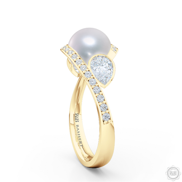 Unique Infinity Pearl Engagement Ring handcrafted in Classic Yellow Gold. Award-winning design featuring dazzling 10.00mm Cultured Akoya Pearl, accentuated by matching GIA Certified, Pear Shaped Diamonds. The infinity intertwined shoulders of the ring are adorned with Round Brilliant diamonds, set in classic bead-set. Free Shipping for All USA Orders. 30Day Returns | BASHERT JEWELRY | Boca Raton, Florida