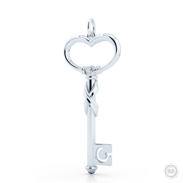 Heart Key Pendant Necklace with an Infinity Twist element. Handcrafted in Sterling Silver or White Gold. We can further style this design with a birthstone of choice. Free Shipping USA. 30-Day Returns. Free Silver Chain | BASHERT JEWELRY | Boca Raton, Florida