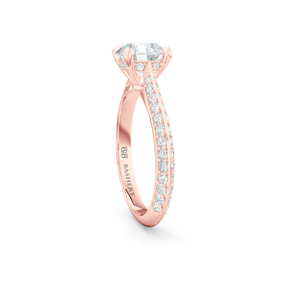 A classic Knife-edge Diamond Solitaire Engagement Ring with a recessed hidden diamond halo. Hand fabricated in Romantic Rose Gold. 100%  recycled, sustainable, precious metals.  GIA Certified Round Brilliant Diamond.  Free Shipping on All USA Orders. 15 Days Returns | BASHERT JEWELRY | Boca Raton, Florida