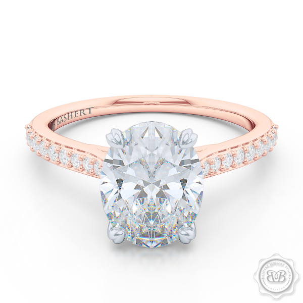 Classic Oval Solitaire Engagement Ring. Handcrafted in two-tone Rose Gold and Platinum. Elegant Bead-Set Diamond Shoulders. Forever One Moissanite by Charles & Colvard.  Free Shipping USA. 30-Day Returns | BASHERT JEWELRY | Boca Raton, Florida.