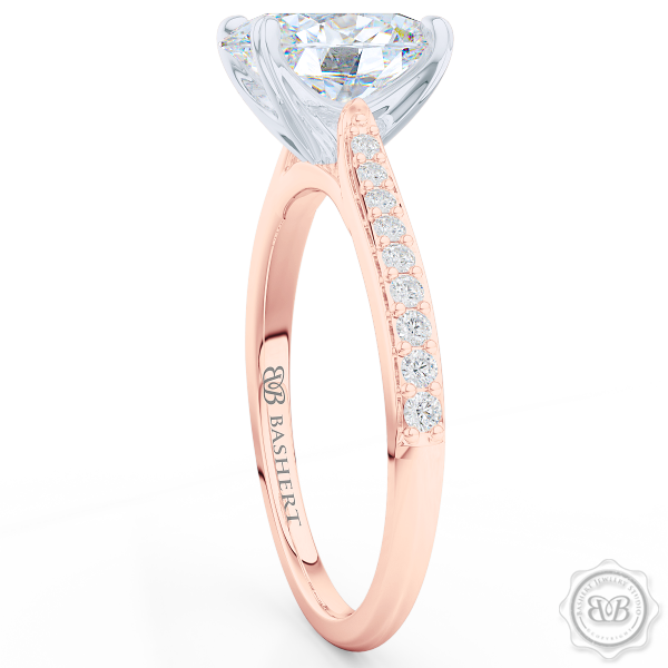 Classic Oval Solitaire Engagement Ring. Handcrafted in two-tone Rose Gold and Platinum. Elegant Bead-Set Diamond Shoulders. Forever One Moissanite by Charles & Colvard.  Free Shipping USA. 30-Day Returns | BASHERT JEWELRY | Boca Raton, Florida.