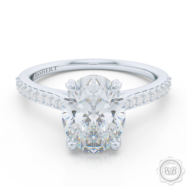 Classic Oval Solitaire Engagement Ring. Handcrafted in White Gold or Platinum. Elegant Bead-Set Diamond Shoulders. Forever One Moissanite by Charles & Colvard.  Free Shipping USA. 30-Day Returns | BASHERT JEWELRY | Boca Raton, Florida.