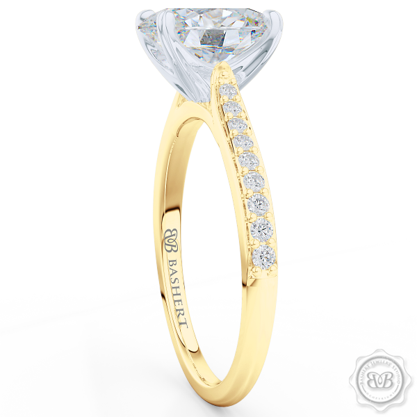 Classic Oval Solitaire Engagement Ring. Handcrafted in two-tone Yellow Gold and Platinum. Elegant Bead-Set Diamond Shoulders. Forever One Moissanite by Charles & Colvard.  Free Shipping USA. 30-Day Returns | BASHERT JEWELRY | Boca Raton, Florida.