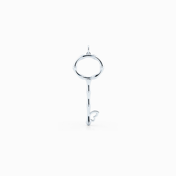 Bamboo inspired, Silver Key Pendant.  Delicate Butterfly accent. Hand-fabricated in sustainable, solid, Sterling Silver. Key pendants are a classic jewelry statement for girls of all ages. Free Shipping for All US Orders. 15 Day Returns | BASHERT JEWELRY | Boca Raton Florida